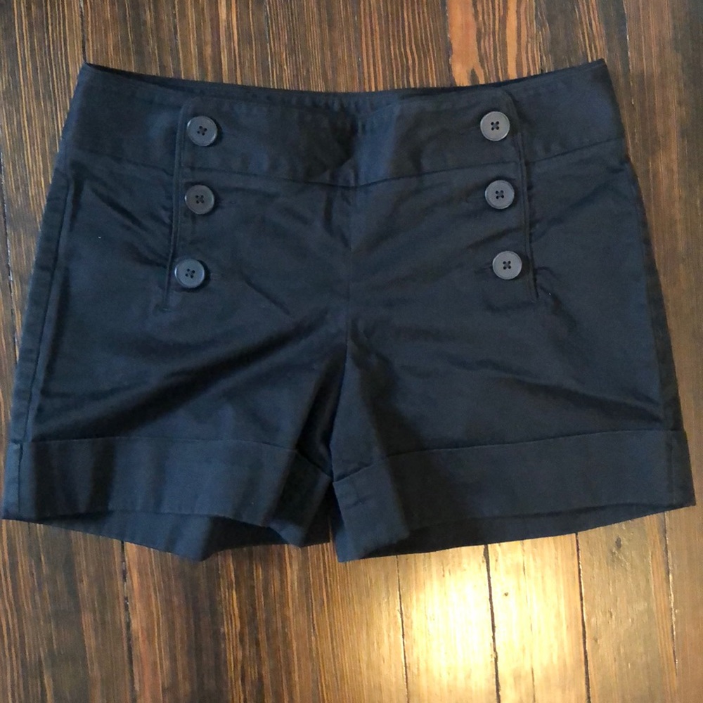 Women’s black shorts with buttons. Size 4